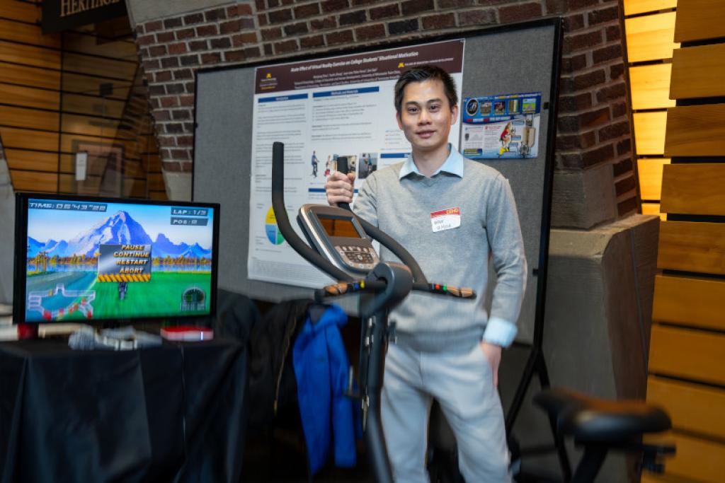 Attendee smiling with prototype