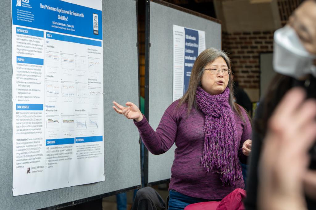 Attendee presenting a poster